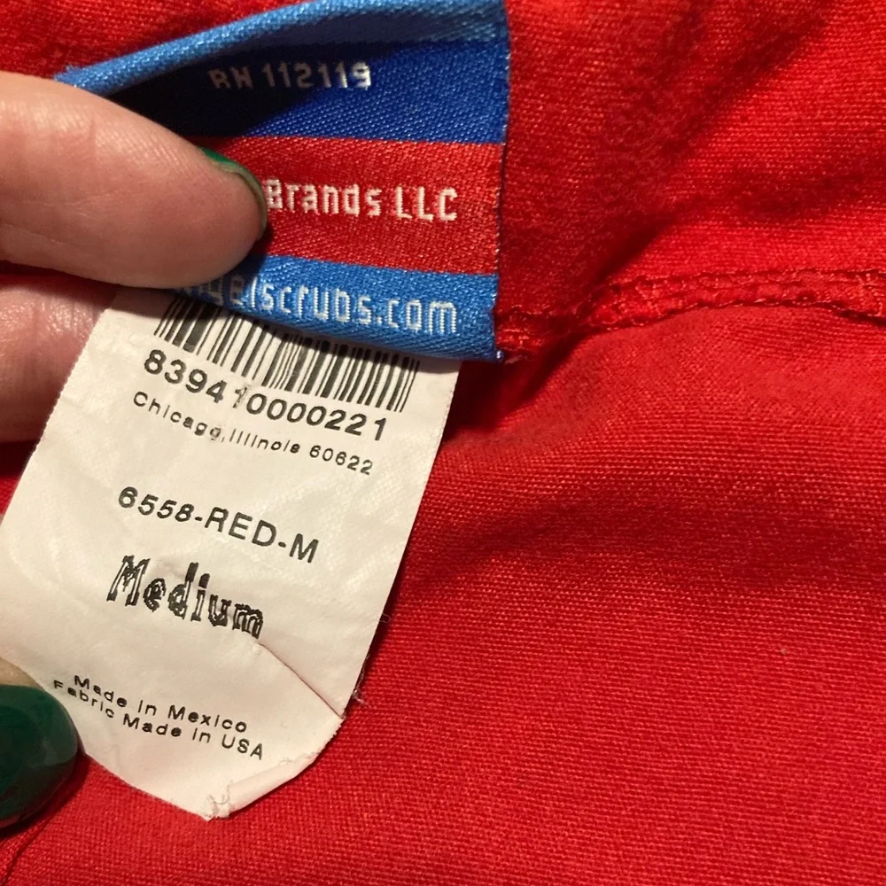 Red Ohio State Buckeyes scrub pants, size medium, small stain under pocket